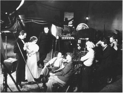 Edgar Ulmer (fourth from left) with Bela Lugosi (from left), Jacqueline Wells, Harry Cording, and John Mescall on the set of The Black Cat