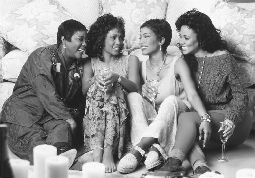 Angela Bassett (second from right) with (l-r) Loretta Devine, Whitney Houston, and Lela Rochon in Waiting to Exhale