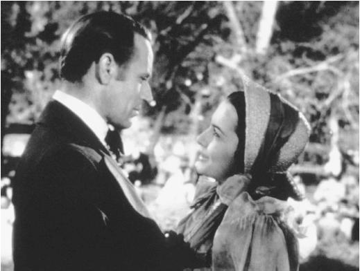 Leslie Howard with Olivia de Havilland in Gone with the Wind