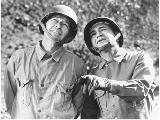 Edward G. Robinson (right) with Robert Mitchum in Mr. Winkle Goes to War